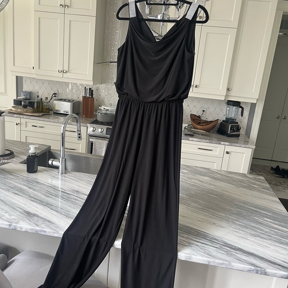 Pants - Sizzling elegant black one piece jumpsuit with rhinestone at shoulders size 8
